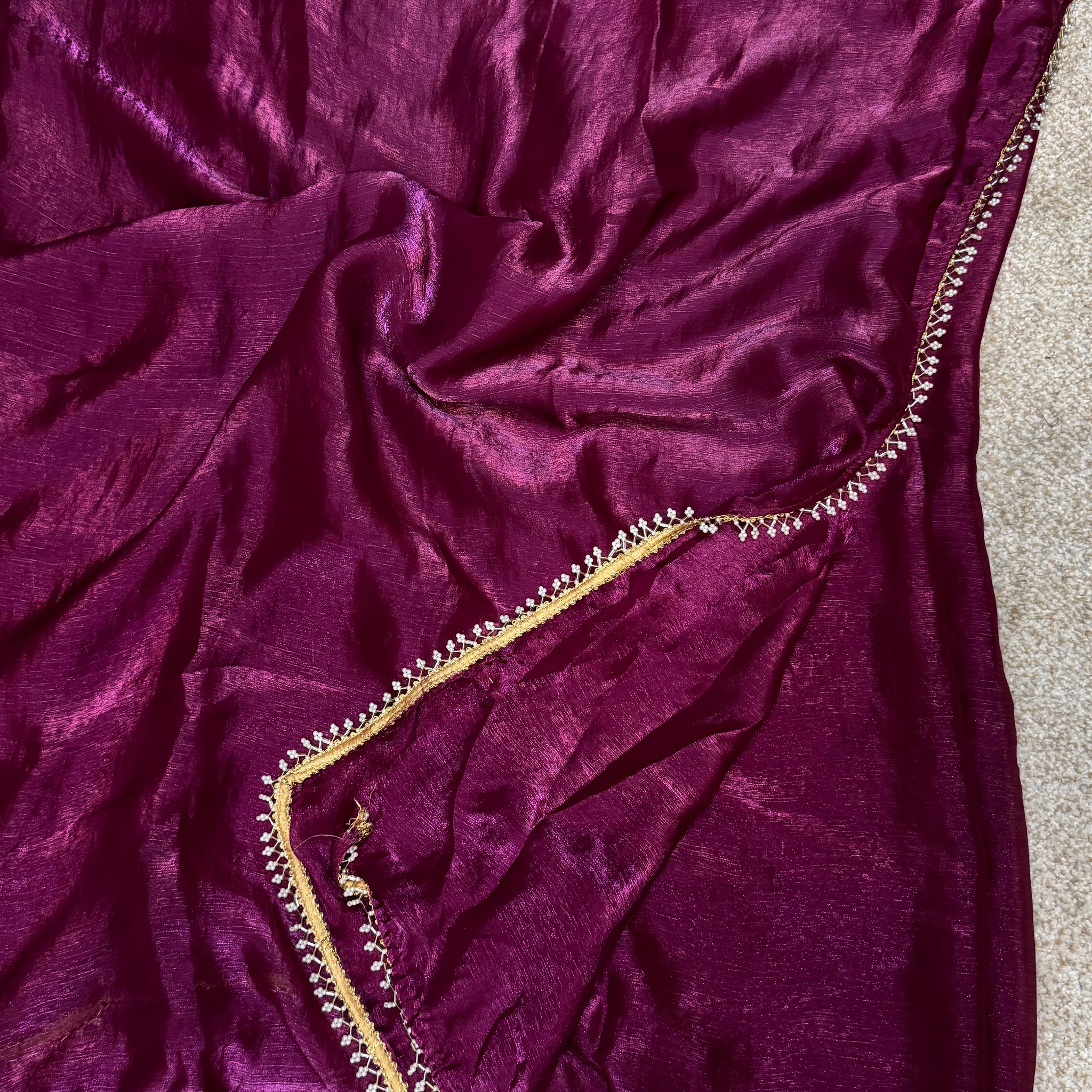 Tissue Saree with a stunning pearl border