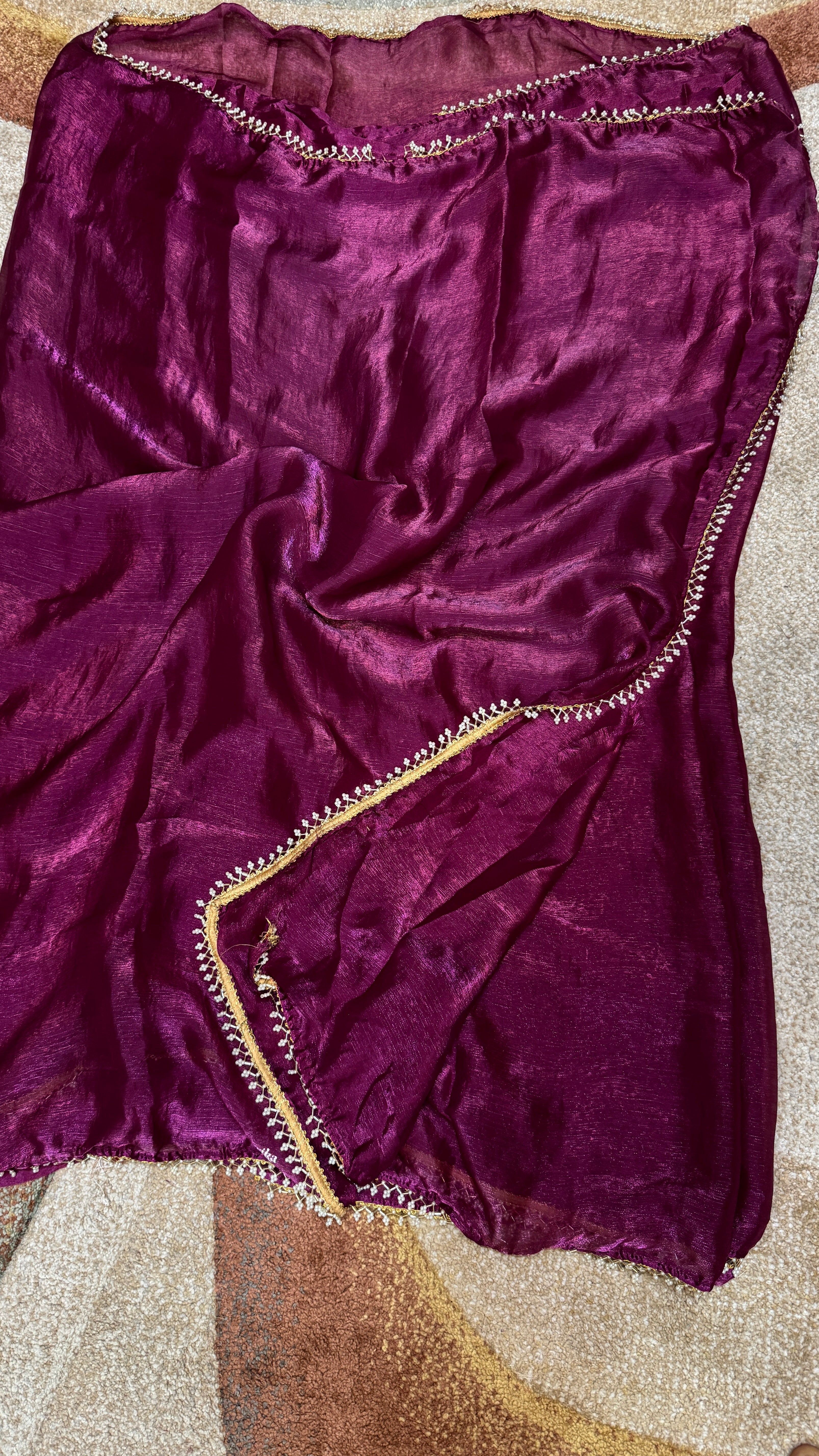 Tissue Saree with a stunning pearl border