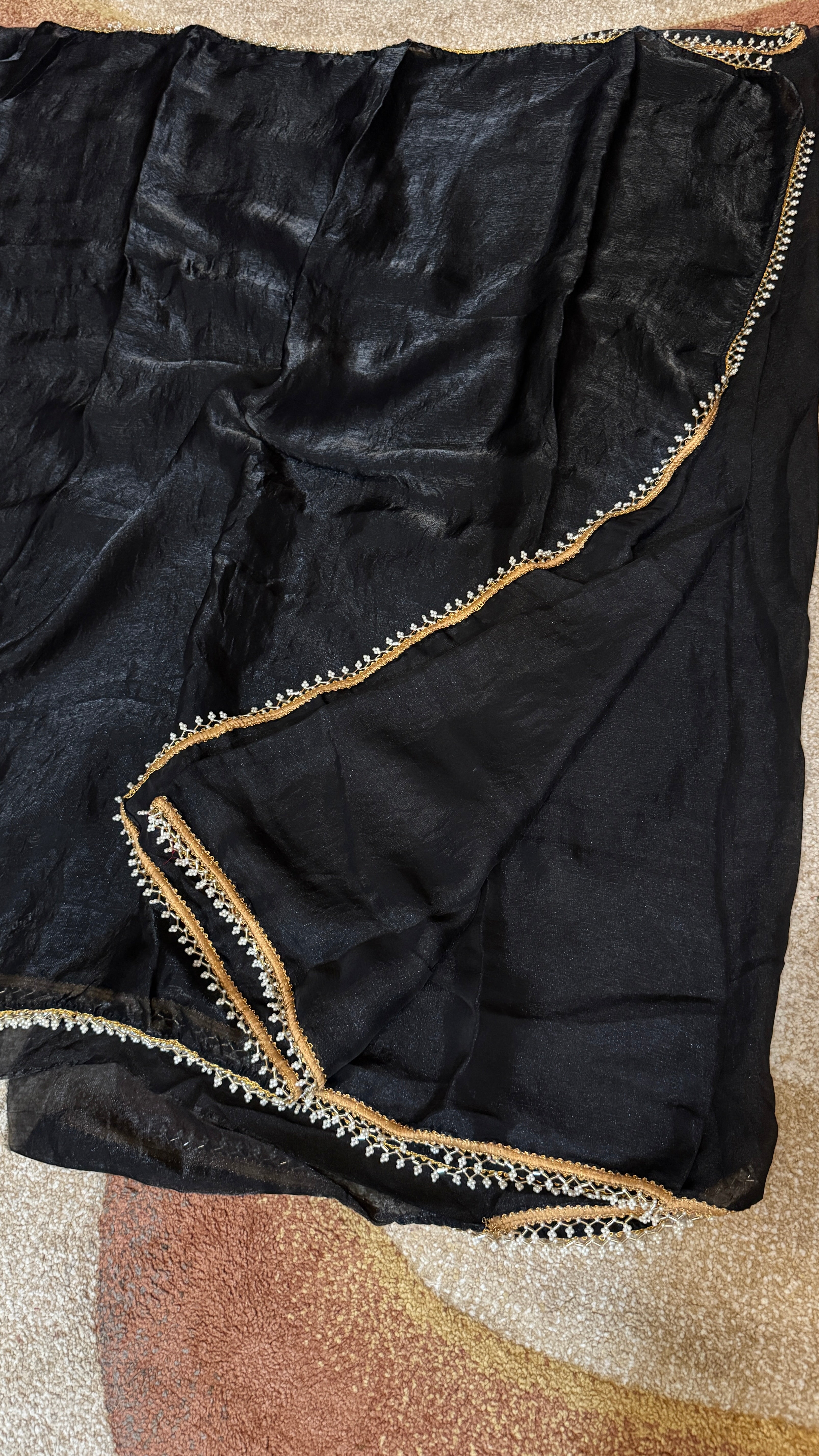 Tissue Saree with a stunning pearl border