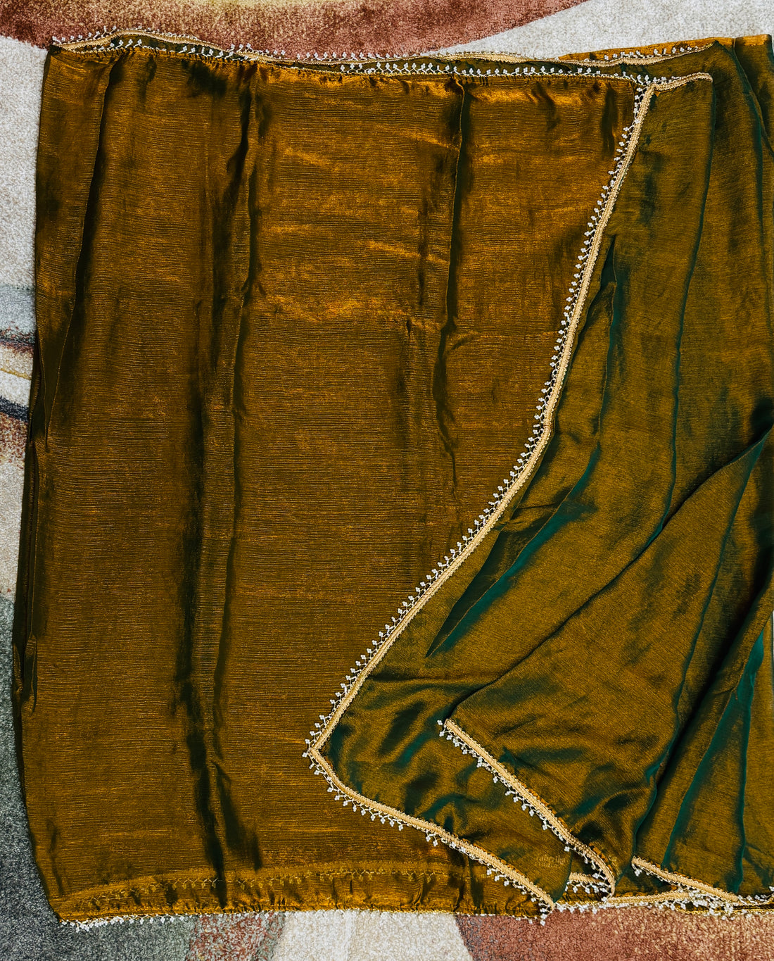 Tissue Saree with a stunning pearl border