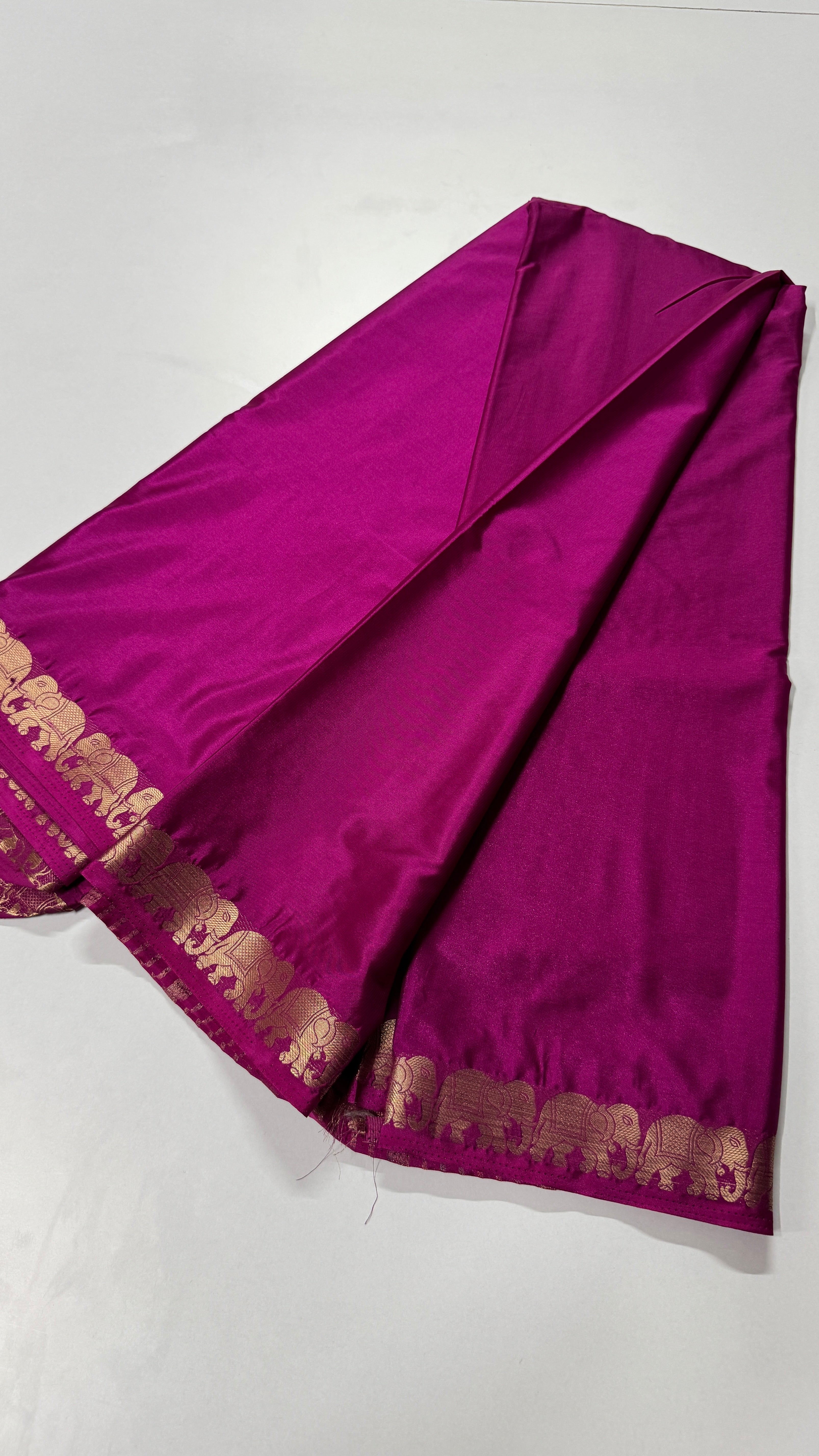 Semi Mysore Crepe Silk saree featuring a beautiful elephant border