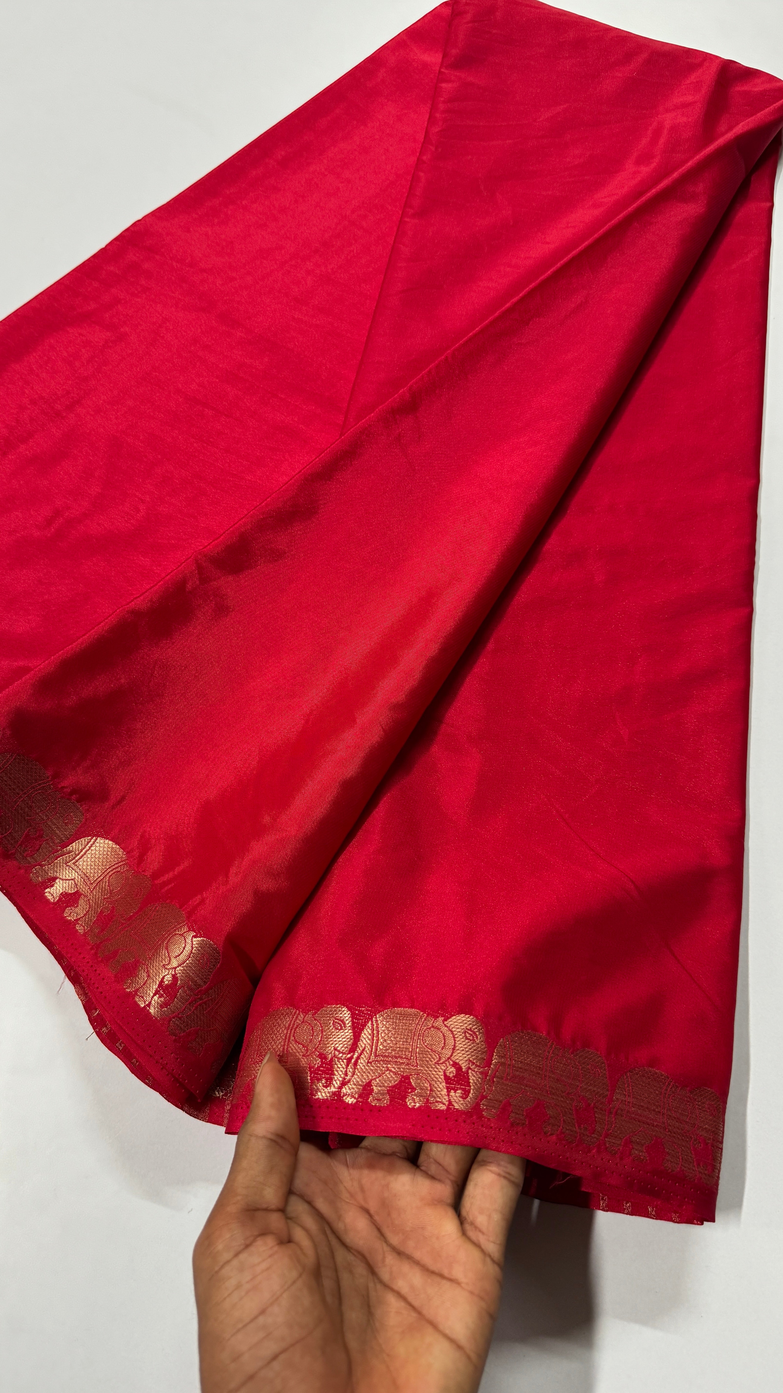 Semi Mysore Crepe Silk saree featuring a beautiful elephant border