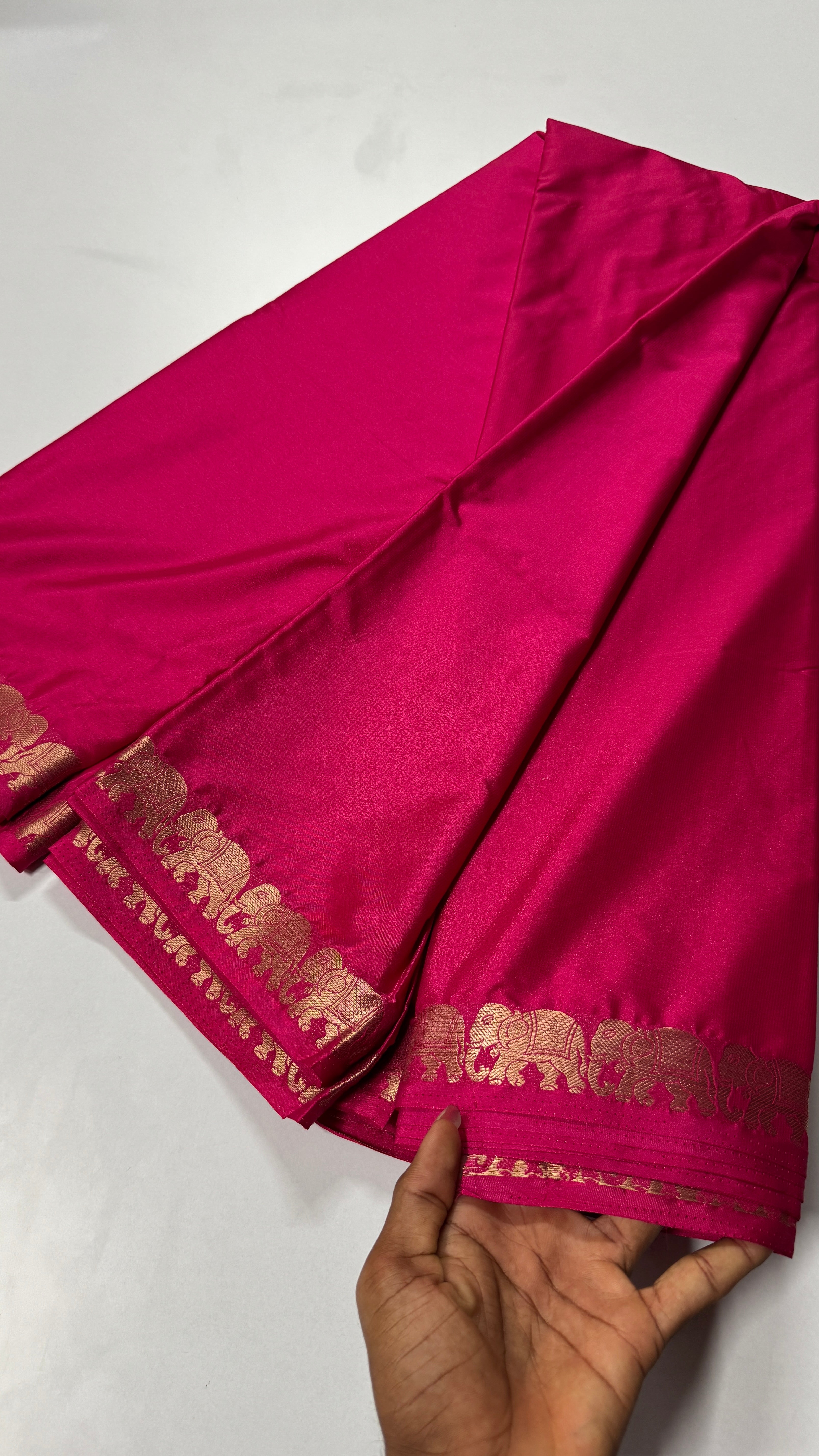 Semi Mysore Crepe Silk saree featuring a beautiful elephant border