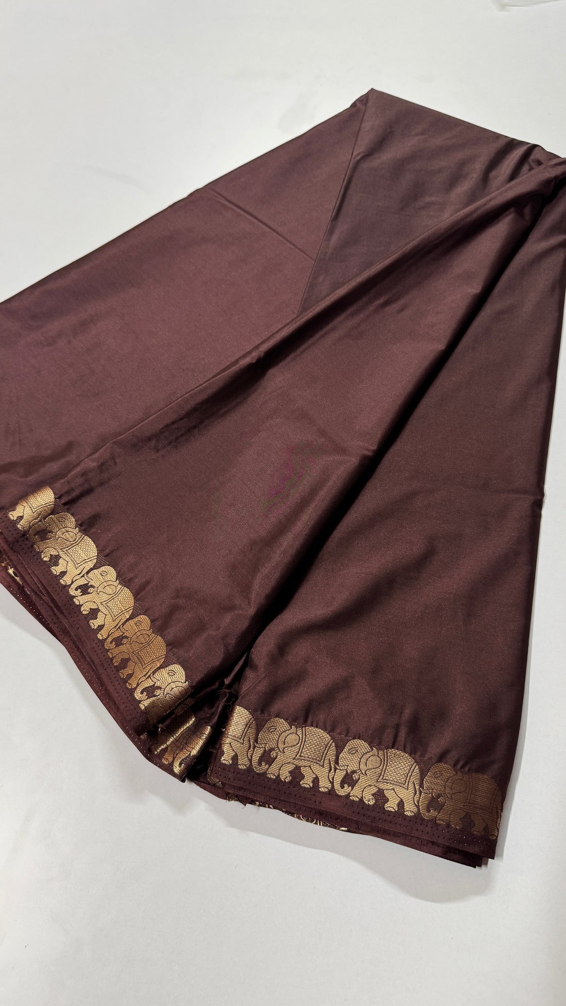 Semi Mysore Crepe Silk saree featuring a beautiful elephant border