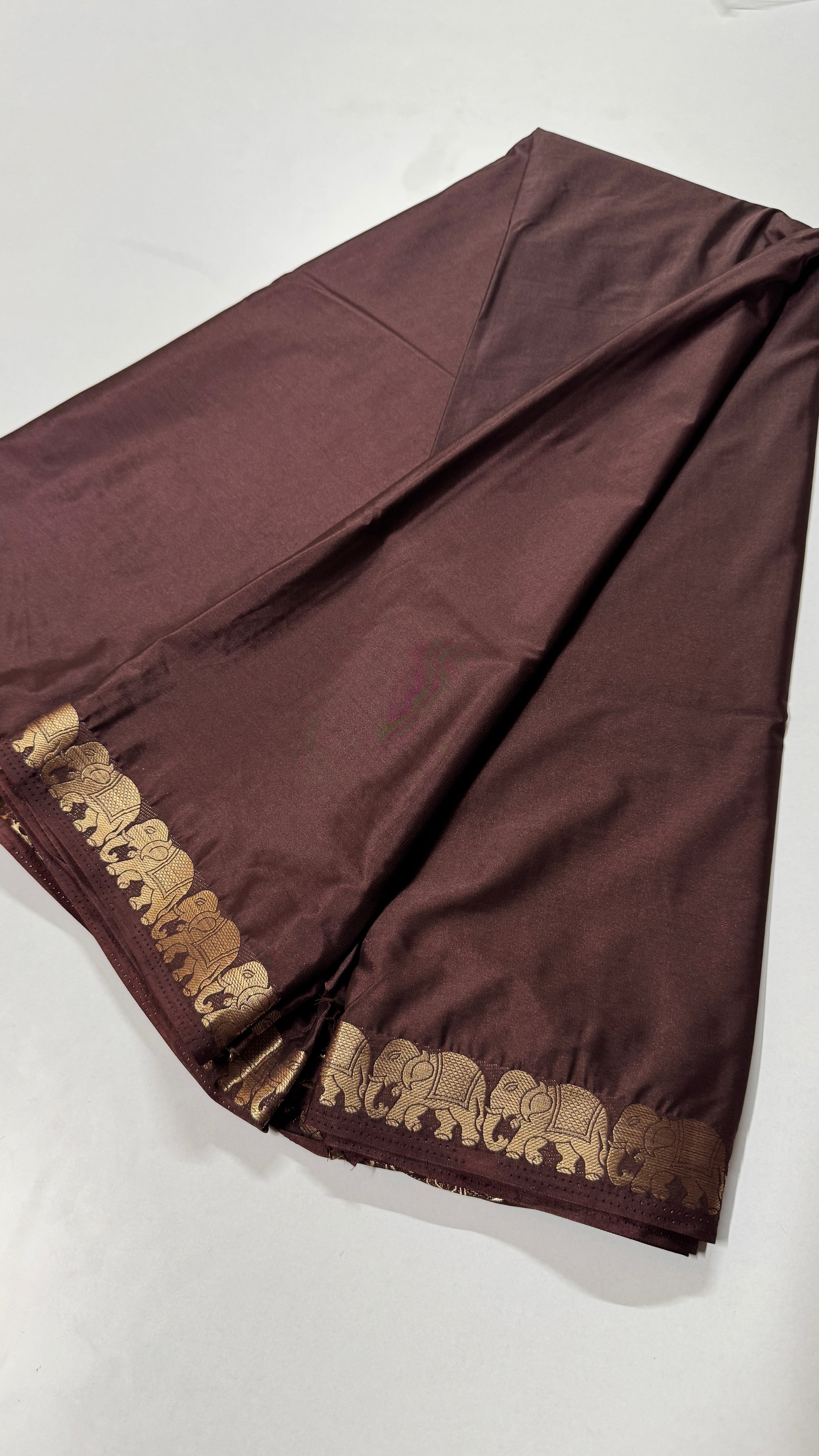Semi Mysore Crepe Silk saree featuring a beautiful elephant border